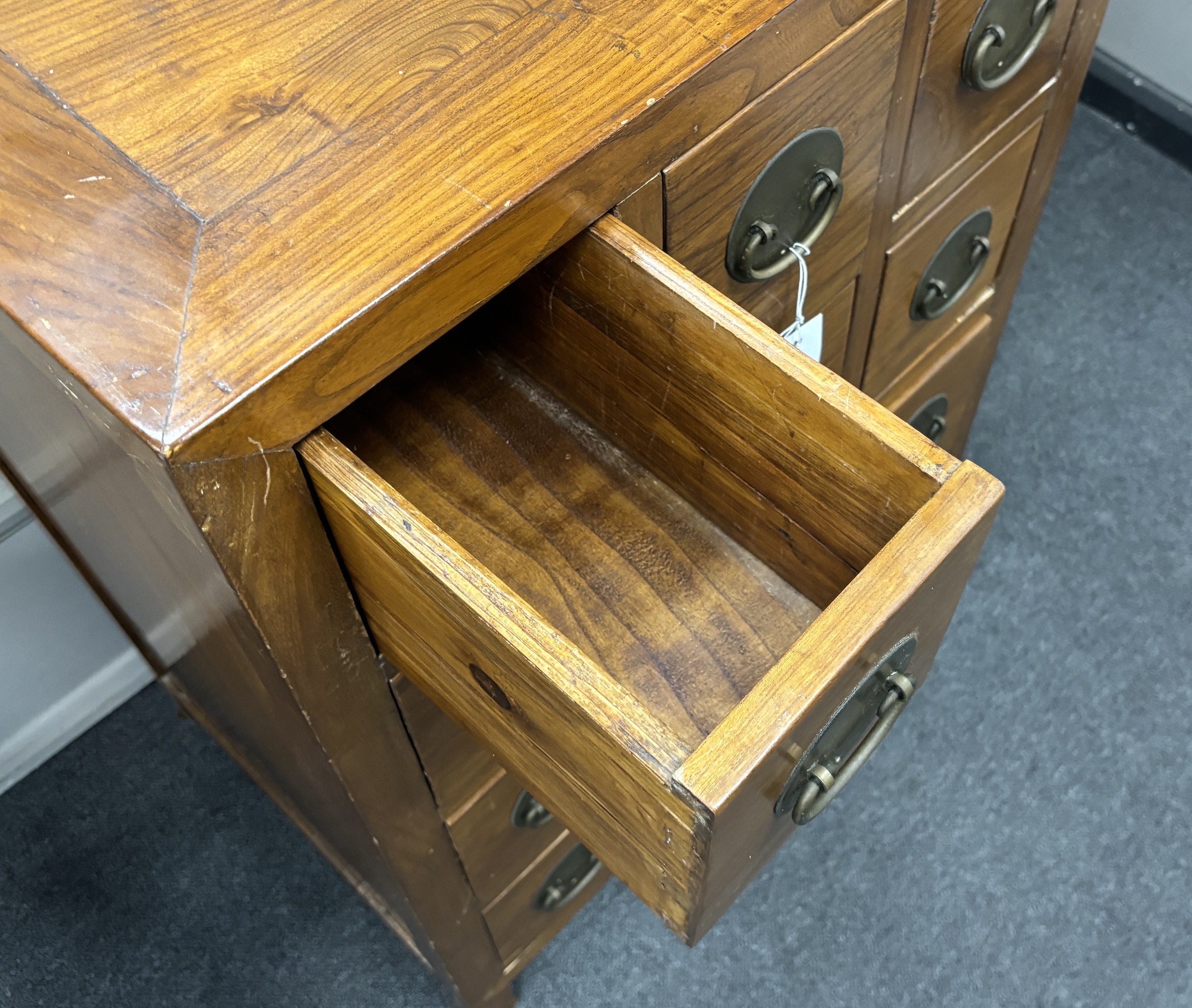 A Chinese jumu chest of twelve drawers, width 61cm, depth 45cm, height 91cm.